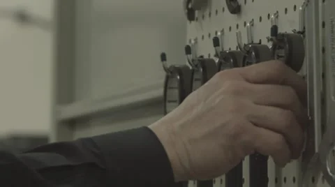 Machinist Takes Tool From Wall in Machine Shop 스톡 동영상 62926808