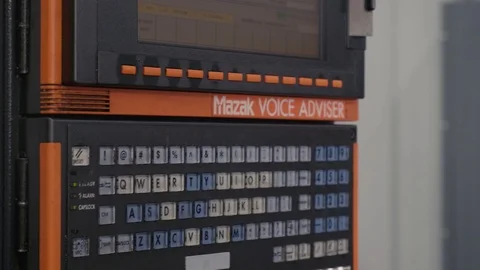 Machinist types in information on a machine Video stock 103336209