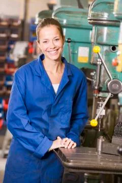 Machinist working on machine Stock Photos