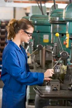 Machinist working on machine Stock Photos