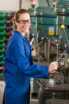 Machinist working on machine Stock Photos