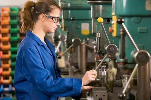 Machinist working on machine Stock Photos