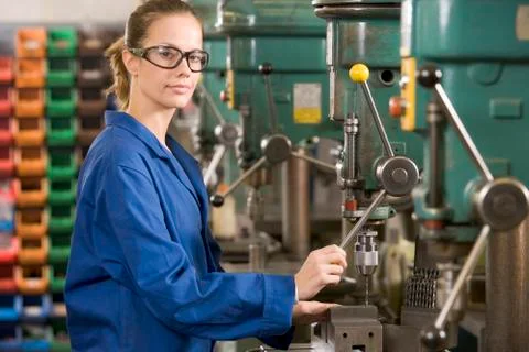 Machinist working on machine Foto stock