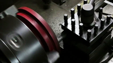 Machinist working a metal lathe Stock Footage