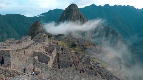 Machu Picchu AM clouds Peru Stock Footage 77886528