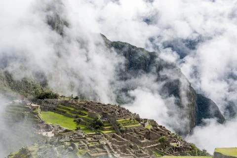 Machu Picchu in the clouds Stock Photos
