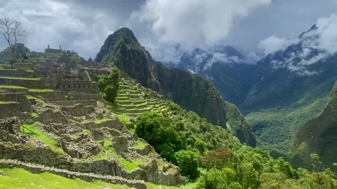 Machu Picchu Inca ruin in clouds, Machu Picchu historical sanctuary Stock Footage 325764346