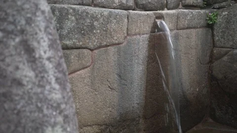 Machu Picchu | Inca Stonework Flowing Water Fountain Gimbal Shot Stock Footage 83580723