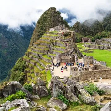 Machu Picchu, panoramic view of peruvian incan town Stock Photos