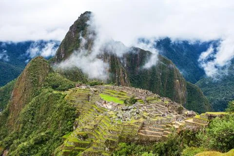 Machu Picchu, panoramic view of peruvian incan town Stock Photos