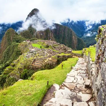 Machu Picchu, panoramic view of peruvian incan town Stock Photos