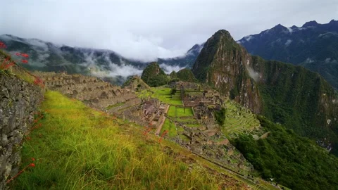 Machu Picchu terrace layers Peru's Inca Temple early morning landscape clouds Stock Footage 334088501