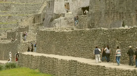 Machu Picchu wide angle showing people moving around Video stock 33831686