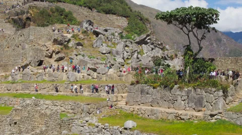 Machu Picchu wide angle in time lapse showing people moving around Stock Footage 33831654