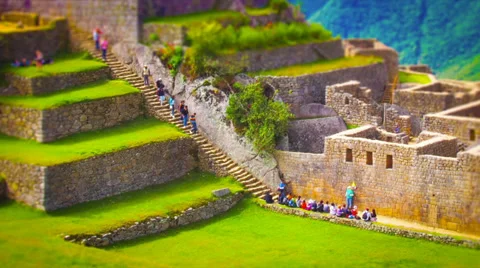 Machu Picchu wide angle in time lapse showing people moving around in tilt shift Stock Footage 33831882