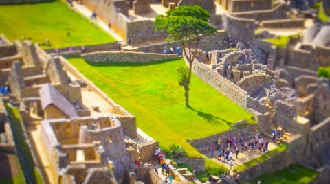 Machu Picchu wide angle in time lapse showing people and tree moving around Video stock 33832047