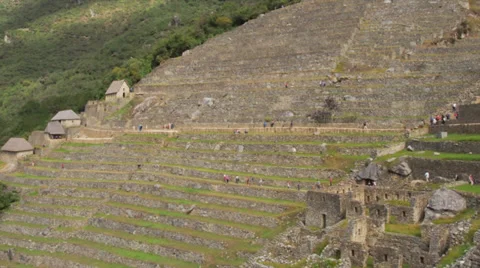 Machu Picchu wide angle in time lapse showing people moving around Stock Footage 33832089