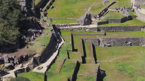 Machu Picchu wide angle in time lapse showing people moving around Stock Footage 33832094
