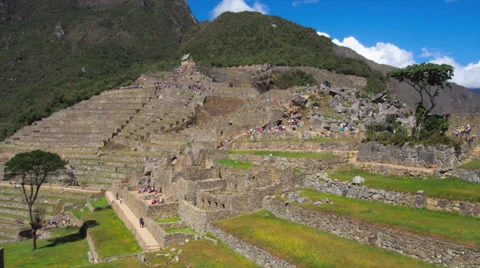 Machu Picchu wide angle in time lapse showing people moving around Stock Footage 33832763
