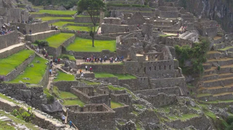 Machu Picchu wide angle in time lapse showing people moving around Stock Footage 33832789