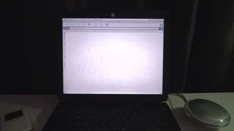 Macintosh Powerbook G3 with Internet Explorer tracking in Stock Footage 152608771