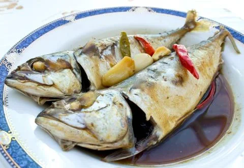 Mackerel in brown sauce Stock Photos
