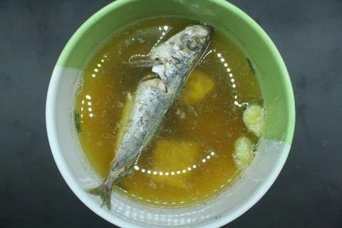 Mackerel fish in a bowl on the table. Stock Photos