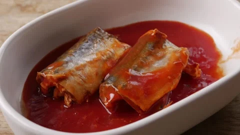 Mackerel fish in rich red tomato sauce Stock Footage 332292879