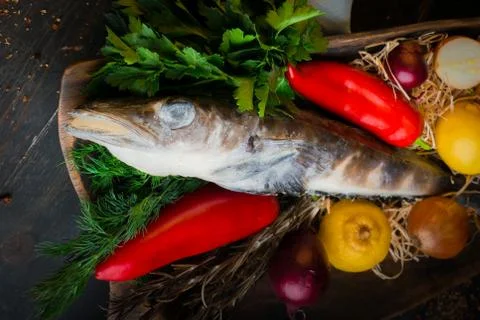 Mackerel icefish in a wooden bowl Stock Photos