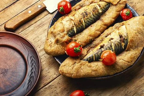 Mackerel or scomber baked in bread loaf Stock Photos