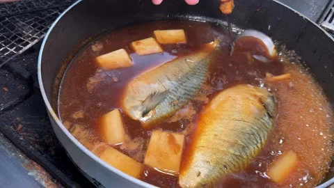 Mackerel Simmered In Miso Broth Chef Ladling Broth Over Fish Izakaya Japan Stock Footage 344633578