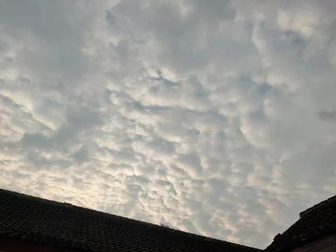 Mackerel Sky Over Rooftops Stock Photos