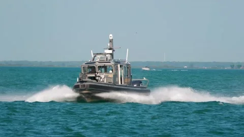 Macomb County Sheriff Boat High Speed Maneuvering Flashing Lights, Lake St Clair Stock Footage 343792061