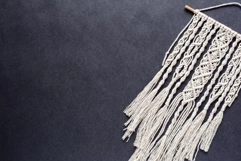 Macrame on black background, place for text, banner, flat layout, handmade Stock Photos