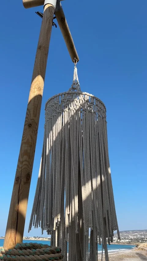 Macrame decor In Wind Near Seashore. Relax On Sea Restaurant. Trip Mood On Beach Stock Footage 252487860