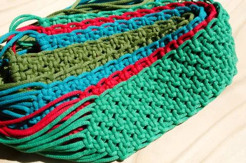 Macrame, a square knot of multi-colored threads. Stock Photos