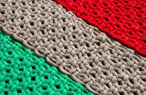 Macrame technique, a square knot of multi-colored threads. Stock Photos