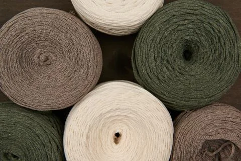 Macrame, weaving, hobby threads multicolored close-up from above Stock Photos