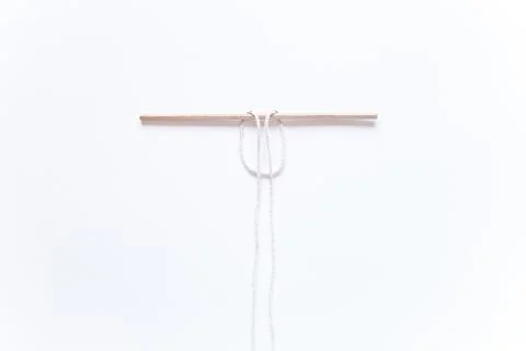 Macrame weaving. step by step instructions securing the cord on the basis of Stock Photos