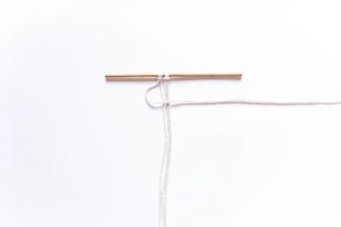 Macrame weaving. step-by-step instructions for the square node. Step 2 Do it  Stock Photos
