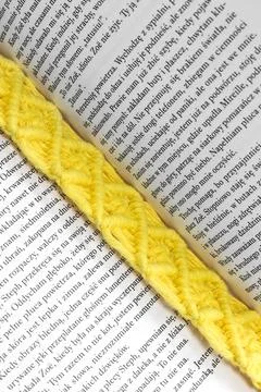 Macrame yellow bookmark Stock Photos