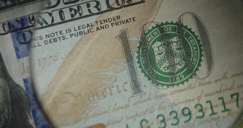 Macro of 100 American banknotes. Banknotes through a magnifying glass. Stock-Footage 168250073