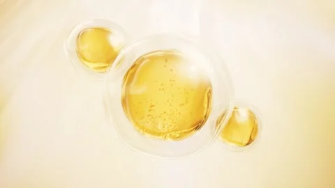 Macro 3D animation of a serum or cosmetic fluid with collagen and vitamins .. Stock Footage 332317125