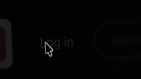Macro 4K footage of a white "Log in" button on a black screen being highlighted  Stock Footage 342777977
