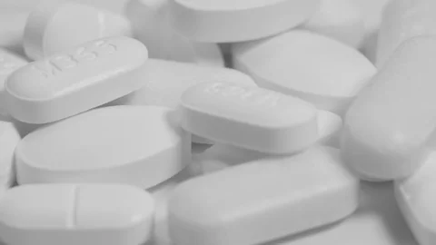 Macro 4k video clips of the white drug pills Stockbeeldmateriaal 110824515