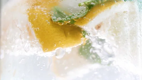 Macro 4k video of misted cold glass of sparkling lemonade with mint Stock Footage 88927933