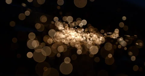 Macro of abstract bokeh flying sparks glitter lights on dark background Stock Footage 270044477