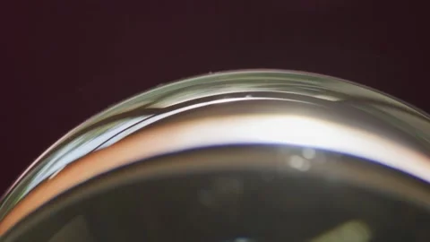 Macro Abstract Glass Orb Reflecting Sunlight, Spinning Slowly Видео 345688622