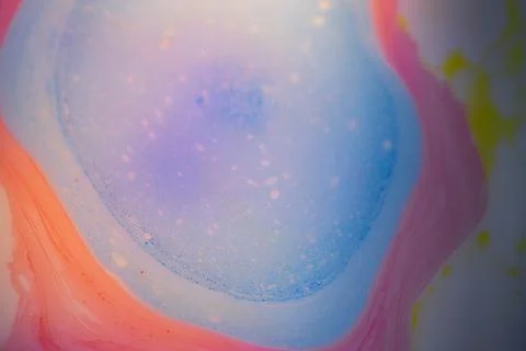 Macro abstract image of a soft blue liquid puddle surrounded. 写真素材
