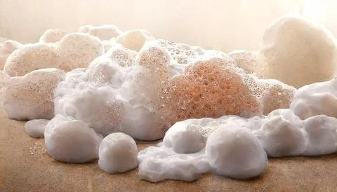 Macro abstract photo of puffy soap foam in bright sun rays. Stock Illustration
